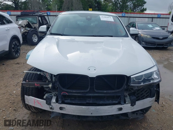 2015 BMW X4 xDrive28i with VIN 5UXXW3C51F0M86668, listed as a IAAI auction lot 42489071 with 59,694 mi miles and . Bid and sale history available at DreamBid. Image 13.