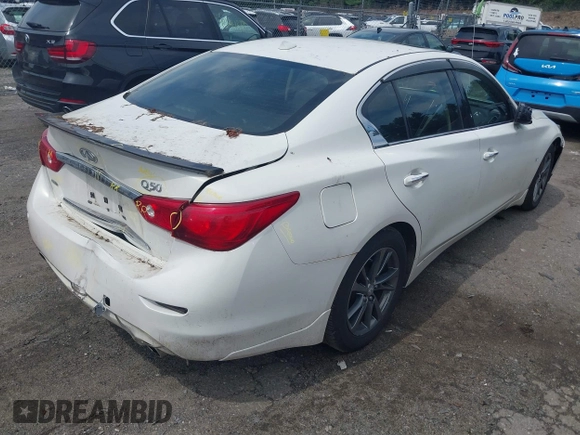 2015 Infiniti Q50 Premium with VIN JN1BV7AR5FM390985, listed as a IAAI auction lot 42641031 with 117,060 mi miles and . Bid and sale history available at DreamBid. Image 4.