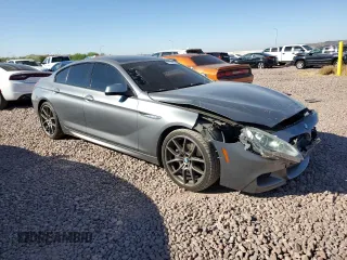 2014 BMW 6 Series 650i z VIN WBA6B2C57ED129034, wystawiony jako Copart lot #72774814 z przebiegiem 116 835 mil mil oraz Szkoda całkowita • Salvage title. Historia ofert i sprzedaży dostępna na DreamBid. Obrazek 4.