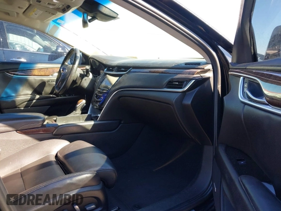 2013 Cadillac XTS Luxury with VIN 2G61P5S33D9101486, listed as a IAAI auction lot 41629349 with 141,050 mi miles. Bid and sale history available at carsss.com. Image 5.