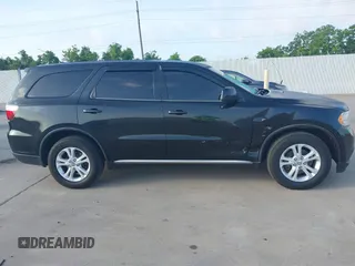 2012 Dodge Durango SXT with VIN 1C4RDJAG7CC293167, listed as a IAAI auction lot 42446634 with 140,182 mi miles and . Bid and sale history available at DreamBid. Image 13.