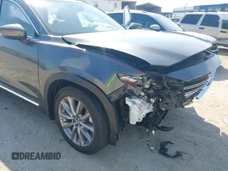 2020 Mazda CX-9 Grand Touring z VIN JM3TCADY8L0417775, wystawiony jako IAAI lot #42306864 z przebiegiem 35 287 mil mil oraz . Historia ofert i sprzedaży dostępna na DreamBid. Obrazek 6.