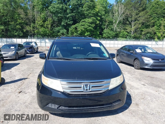 2011 Honda Odyssey EX-L with VIN 5FNRL5H67BB087064, listed as a IAAI auction lot 42326427 with 177,795 mi miles and . Bid and sale history available at DreamBid. Image 12.