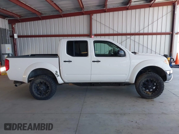 2006 Nissan Frontier SE z VIN 1N6AD07U06C469157, wystawiony jako IAAI lot #42249320 z przebiegiem 189 936 mil mil oraz . Historia ofert i sprzedaży dostępna na DreamBid. Obrazek 13.