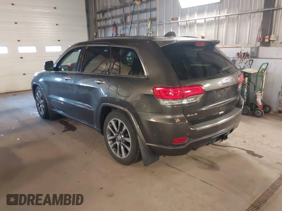 2018 Jeep Grand Cherokee High Altitude with VIN 1C4RJFCG3JC506731, listed as a IAAI auction lot 41269238 with 74,791 mi miles. Bid and sale history available at carsss.com. Image 3.