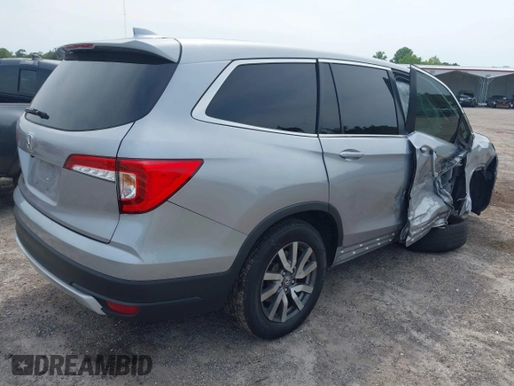 2021 Honda Pilot EX z VIN 5FNYF5H3XMB030112, wystawiony jako IAAI lot #42204148 z przebiegiem 96 182 mil mil oraz . Historia ofert i sprzedaży dostępna na DreamBid. Obrazek 4.