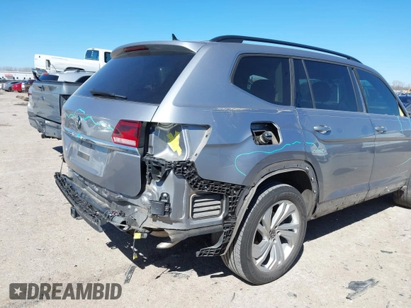 2023 Volkswagen Atlas SE z VIN 1V2JR2CA4PC526973, wystawiony jako IAAI lot #41712167 z przebiegiem 77 370 mil mil oraz . Historia ofert i sprzedaży dostępna na DreamBid. Obrazek 13.
