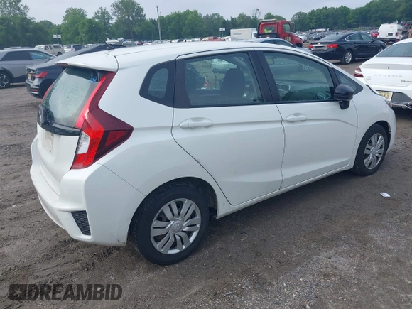 2015 Honda Fit LX with VIN 3HGGK5H51FM752870, listed as a IAAI auction lot 42378020 with 109,698 mi miles and . Bid and sale history available at DreamBid. Image 4.