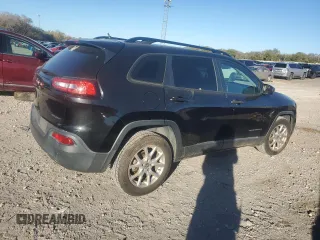 2015 Jeep Cherokee Sport with VIN 1C4PJLAB8FW663173, listed as a Copart auction lot 81185614 with 126,738 mi miles and Salvage title. Bid and sale history available at DreamBid. Image 3.