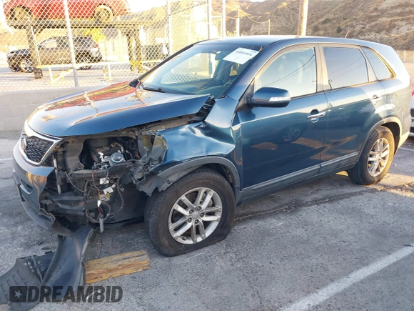 2015 Kia Sorento LX with VIN 5XYKT3A69FG607845, listed as a IAAI auction lot 40806894 with 102,416 mi miles and . Bid and sale history available at DreamBid. Image 2.