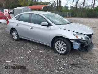 2019 Nissan Sentra S z VIN 3N1AB7AP1KY359954, wystawiony jako IAAI lot #41955958 z przebiegiem 86 686 mil mil oraz . Historia ofert i sprzedaży dostępna na DreamBid. Obrazek 1.