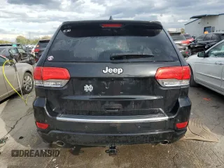 2014 Jeep Grand Cherokee Overland with VIN 1C4RJECG1EC556155, listed as a Copart auction lot 75641034 with 116,549 mi miles and Salvage Title. Bid and sale history available at carsss.com. Image 6.