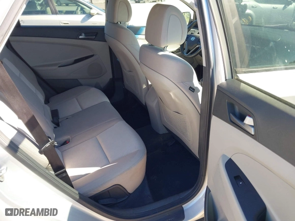 2016 Hyundai Tucson Sport with VIN KM8J33A25GU224084, listed as a IAAI auction lot 41827851 with 153,348 mi miles. Bid and sale history available at carsss.com. Image 8.