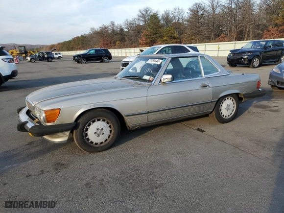 1987 Mercedes-Benz 560 Series 560SL with VIN WDBBA48D9HA070265, listed as a Copart auction lot 77411844 with 120,884 mi miles and Salvage Title. Bid and sale history available at carsss.com. Image 1.