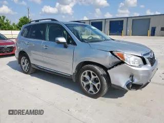 2015 Subaru Forester Touring with VIN JF2SJAWC0FH529845, listed as a Copart auction lot 61147525 with 75,686 mi miles and Salvage title. Bid and sale history available at DreamBid. Image 4.