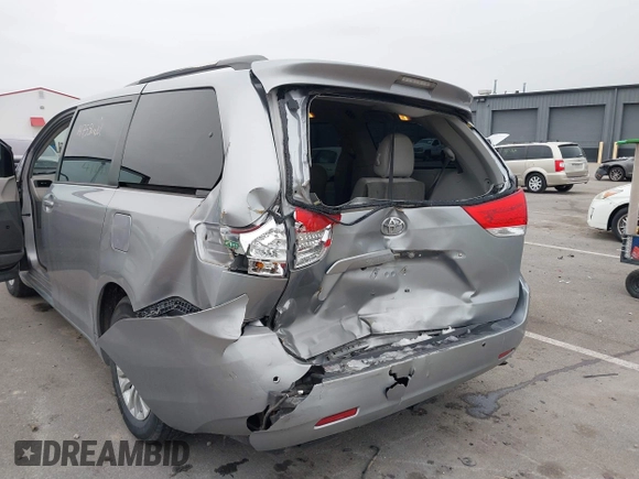 2011 Toyota Sienna XLE AAS with VIN 5TDYK3DC5BS150527, listed as a IAAI auction lot 41143189 with 147,551 mi miles and . Bid and sale history available at DreamBid. Image 6.