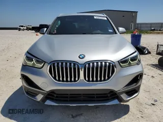 2021 BMW X1 sDrive28i z VIN WBXJG7C04M5T32801, wystawiony jako Copart lot #52046425 z przebiegiem 45 584 mil mil oraz Szkody całkowita. Historia ofert i sprzedaży dostępna na DreamBid. Obrazek 5.