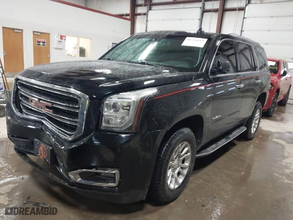 2017 GMC Yukon SLT with VIN 1GKS2BKC0HR147128, listed as a IAAI auction lot 41226119 with 147,557 mi miles. Bid and sale history available at carsss.com. Image 2.