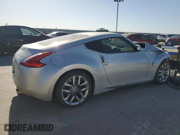 2013 Nissan 370Z with VIN JN1AZ4EH2DM880023, listed as a Copart auction lot 49601885 with 79,196 mi miles and Salvage Title. Bid and sale history available at carsss.com. Image 3.