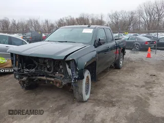 2015 Chevrolet Silverado 1500 LT with VIN 1GCVKREC3FZ318691, listed as a IAAI auction lot 42152259 with 77,897 mi miles. Bid and sale history available at carsss.com. Image 2.