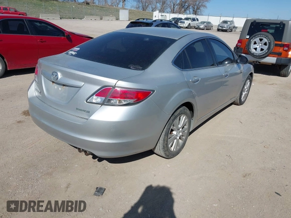 2009 Mazda 6 i Touring with VIN 1YVHP82A795M31562, listed as a IAAI auction lot 41970484 with 128,724 mi miles and . Bid and sale history available at carsss.com. Image 4.