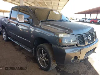 2004 Nissan Titan LE z VIN 1N6AA07B14N510971, wystawiony jako IAAI lot #42262783 z przebiegiem 305 943 mil mil oraz . Historia ofert i sprzedaży dostępna na DreamBid. Obrazek 1.