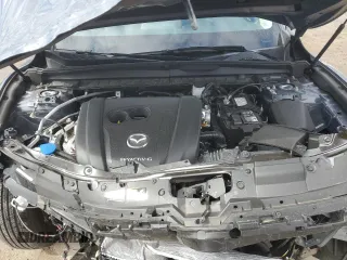 2024 Mazda CX-50 S Select z VIN 7MMVABAM1RN234115, wystawiony jako Copart lot #49570475 z przebiegiem Nie podano mil oraz Szkody całkowita. Historia ofert i sprzedaży dostępna na DreamBid. Obrazek 12.