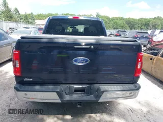 2021 Ford F-150 XL z VIN 1FTFW1E5XMFA57179, wystawiony jako IAAI lot #42561205 z przebiegiem 90 517 mil mil oraz . Historia ofert i sprzedaży dostępna na DreamBid. Obrazek 16.