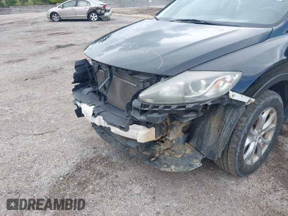 2015 Mazda CX-9 Touring with VIN JM3TB2CA4F0465730, listed as a IAAI auction lot 42512203 with 179,805 mi miles and . Bid and sale history available at DreamBid. Image 19.