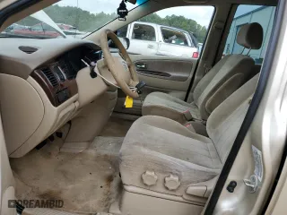 2000 Mazda MPV DX with VIN JM3LW28G0Y0116245, listed as a Copart auction lot 71654914 with 330,693 mi miles and Salvage Title. Bid and sale history available at carsss.com. Image 7.