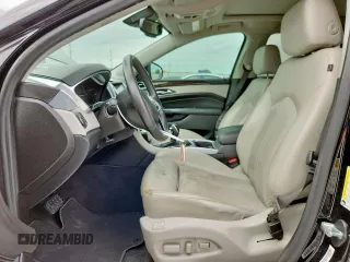 2016 Cadillac SRX Premium Collection with VIN 3GYFNDE35GS566884, listed as a Copart auction lot 62425985 with 27,133 mi miles and Salvage title. Bid and sale history available at DreamBid. Image 7.