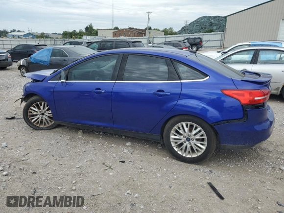 2015 Ford Focus Titanium z VIN 1FADP3J20FL299209, wystawiony jako Copart lot #67681504 z przebiegiem 98 711 mil mil oraz Nie do naprawy • Non repairable. Historia ofert i sprzedaży dostępna na DreamBid. Obrazek 2.