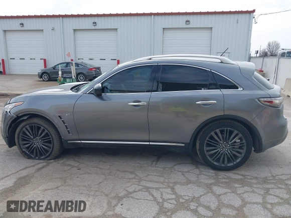 2017 Infiniti QX70 z VIN JN8CS1MW9HM412647, wystawiony jako IAAI lot #41830232 z przebiegiem 114 954 mil mil oraz . Historia ofert i sprzedaży dostępna na DreamBid. Obrazek 15.