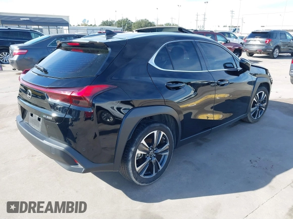 2021 Lexus UX with VIN JTHP3JBH2M2045075, listed as a IAAI auction lot 40979086 with 44,578 mi miles. Bid and sale history available at carsss.com. Image 4.