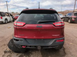 2015 Jeep Cherokee Trailhawk z VIN 1C4PJMBSXFW649425, wystawiony jako Copart lot #52900735 z przebiegiem 89 345 mil mil oraz Szkoda całkowita • Salvage title. Historia ofert i sprzedaży dostępna na DreamBid. Obrazek 6.