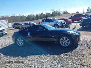 2003 Nissan 350Z Touring z VIN JN1AZ34E73T014727, wystawiony jako IAAI lot #41377420 z przebiegiem 170 323 mil mil oraz . Historia ofert i sprzedaży dostępna na DreamBid. Obrazek 14.