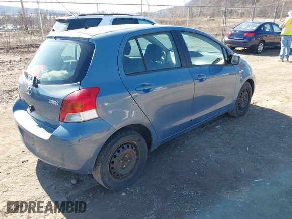 2010 Toyota Yaris with VIN JTDKT4K3XA5282294, listed as a IAAI auction lot 41856423 with 264,409 mi miles. Bid and sale history available at carsss.com. Image 4.