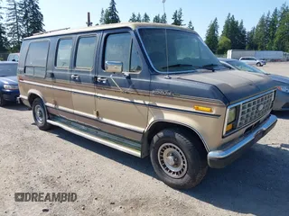 1987 Ford Econoline Cargo z VIN 1FDEE14N1HHA14761, wystawiony jako IAAI lot #42368430 z przebiegiem 88 341 mil mil oraz . Historia ofert i sprzedaży dostępna na DreamBid. Obrazek 1.