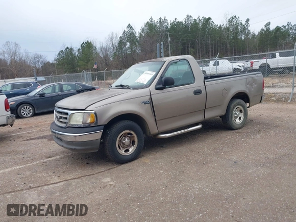 2002 Ford F-150 XL with VIN 3FTRF17212MA23970, listed as a IAAI auction lot 40991449 with 216,487 mi miles. Bid and sale history available at carsss.com. Image 2.