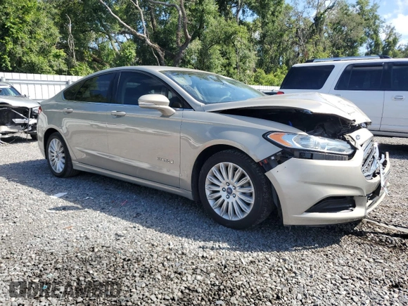 2015 Ford Fusion SE Hybrid z VIN 3FA6P0LU7FR102723, wystawiony jako Copart lot #62334345 z przebiegiem 136 341 mil mil oraz Nie do naprawy • Non repairable. Historia ofert i sprzedaży dostępna na DreamBid. Obrazek 4.