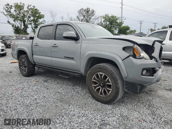 2020 Toyota Tacoma SR5 with VIN 3TMAZ5CNXLM121344, listed as a Copart auction lot 59393395 with 69,902 mi miles and Salvage title. Bid and sale history available at DreamBid. Image 4.