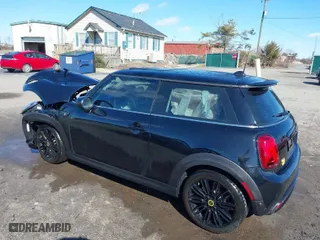 2024 MINI Hardtop 2 Door Cooper SE with VIN WMW13DJ03R2V25523, listed as a IAAI auction lot 41585964 with 7,690 mi miles. Bid and sale history available at carsss.com. Image 3.