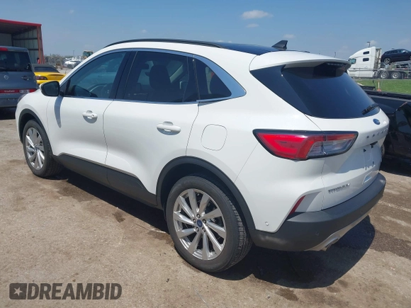 2021 Ford Escape Titanium with VIN 1FMCU9J91MUA29407, listed as a IAAI auction lot 42120442 with 19,314 mi miles and . Bid and sale history available at DreamBid. Image 3.
