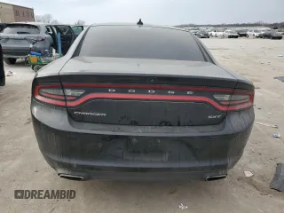 2015 Dodge Charger SXT z VIN 2C3CDXHG4FH844496, wystawiony jako Copart lot #86100084 z przebiegiem 110 090 mil mil oraz Szkoda całkowita • Salvage title. Historia ofert i sprzedaży dostępna na DreamBid. Obrazek 6.