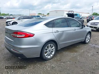 2020 Ford Fusion SE with VIN 3FA6P0HD5LR262877, listed as a IAAI auction lot 42243525 with 53,071 mi miles and . Bid and sale history available at DreamBid. Image 4.