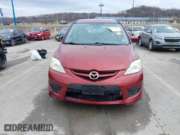 2009 Mazda Mazda5 Sport with VIN JM1CR293X90339440, listed as a IAAI auction lot 41525453 with 173,640 mi miles. Bid and sale history available at carsss.com. Image 12.
