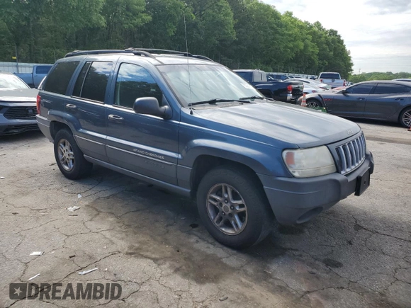 2004 Jeep Grand Cherokee Laredo with VIN 1J4GX48S24C216941, listed as a Copart auction lot 55584785 with 279,710 mi miles and Salvage title. Bid and sale history available at DreamBid. Image 4.