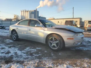 2003 Oldsmobile Aurora z VIN 1G3GS64C034150414, wystawiony jako Copart lot #88490635 z przebiegiem 119 061 mil mil oraz Szkody całkowita. Historia ofert i sprzedaży dostępna na DreamBid. Obrazek 4.