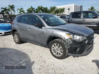 2015 Mazda CX-5 Sport with VIN JM3KE2BE2F0445810, listed as a Copart auction lot 65672555 with 218,675 mi miles and Clean title. Bid and sale history available at DreamBid. Image 4.