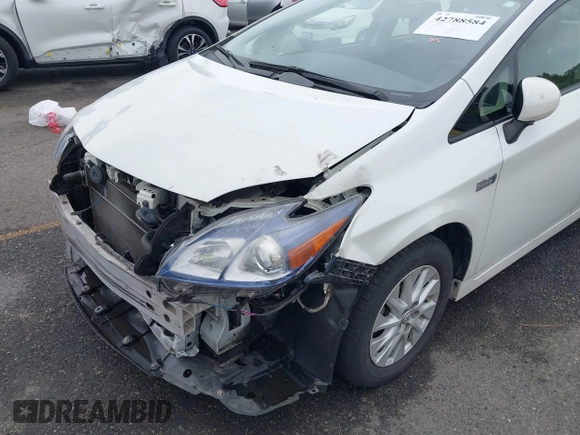 2012 Toyota Prius with VIN JTDKN3DP5C3003868, listed as a IAAI auction lot 42788584 with 148,769 mi miles and . Bid and sale history available at DreamBid. Image 6.